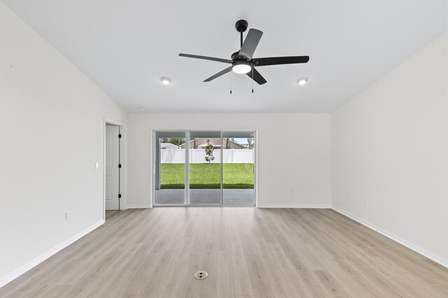 10 Reine Pl, Palm Coast, FL 32164 - spare room featuring light wood-type flooring, a ceiling fan, baseboards, and lofted ceiling