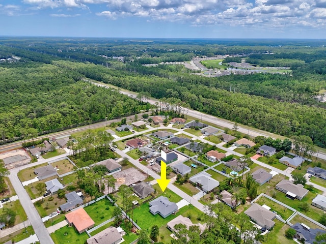 10 Reine Pl, Palm Coast, FL 32164 - aerial overview of property's location featuring a heavily wooded area and nearby suburban area