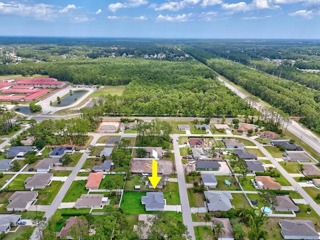 10 Reine Pl, Palm Coast, FL 32164 - aerial overview of property's location featuring a forest and nearby suburban area