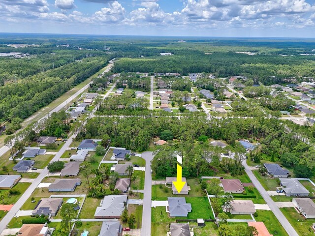 10 Reine Pl, Palm Coast, FL 32164 - view of property location with nearby suburban area and a forest