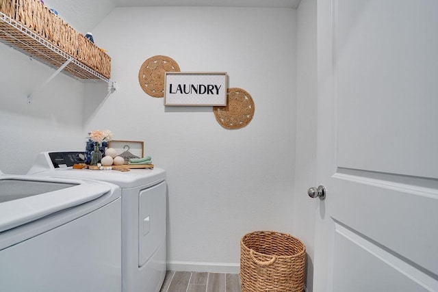 washroom featuring washing machine and dryer