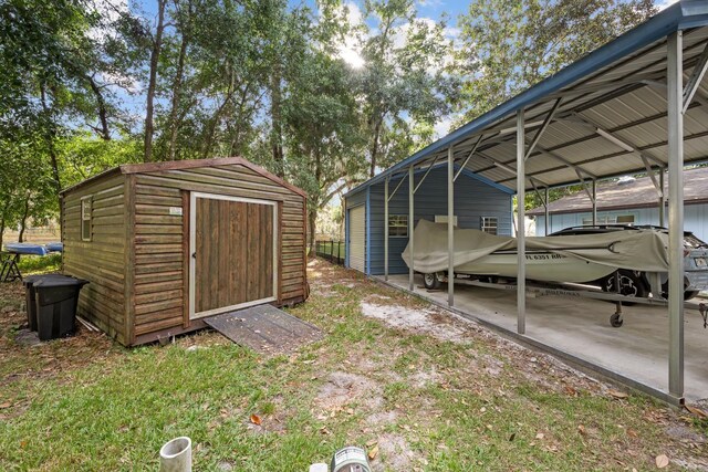 view of parking / parking lot featuring a carport