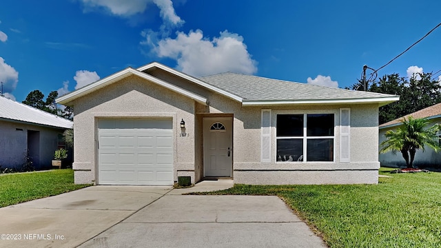 single story home with a garage and a front yard