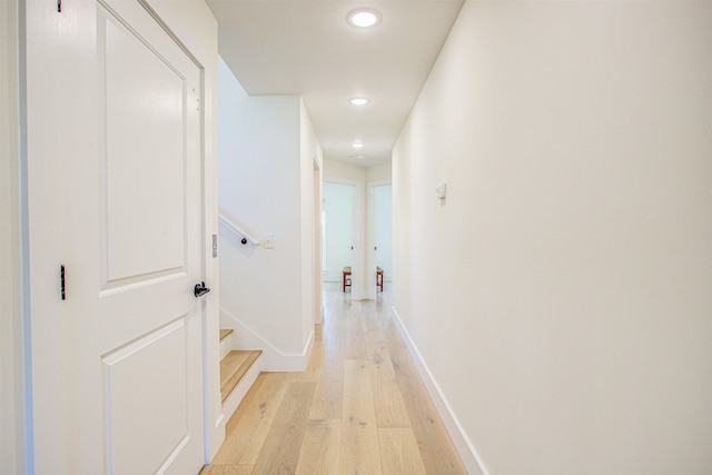 corridor featuring light hardwood / wood-style floors