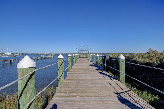 view of dock with a water view