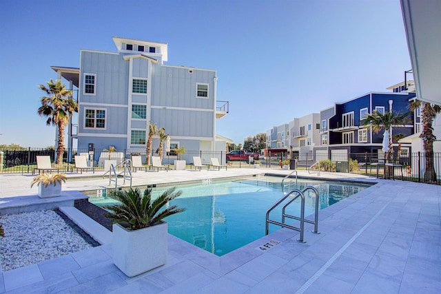 view of swimming pool featuring a patio