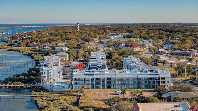 drone / aerial view with a water view