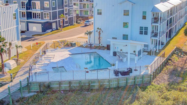 view of swimming pool with a patio