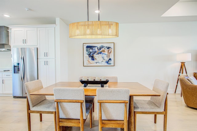 dining area featuring light hardwood / wood-style flooring