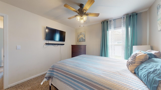 bedroom featuring ceiling fan and carpet floors