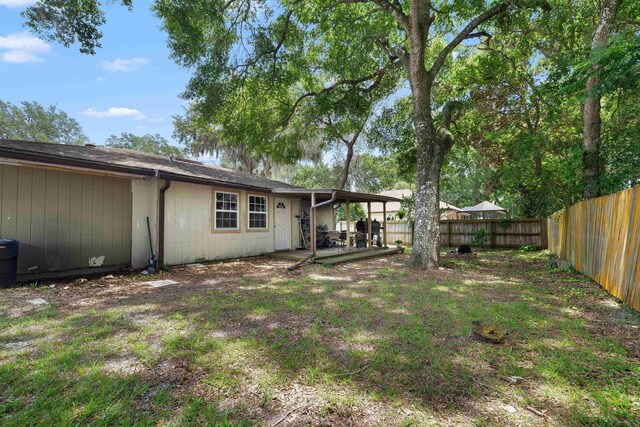 424 Orchis Rd, Saint Augustine, FL 32086 - fenced backyard featuring a patio