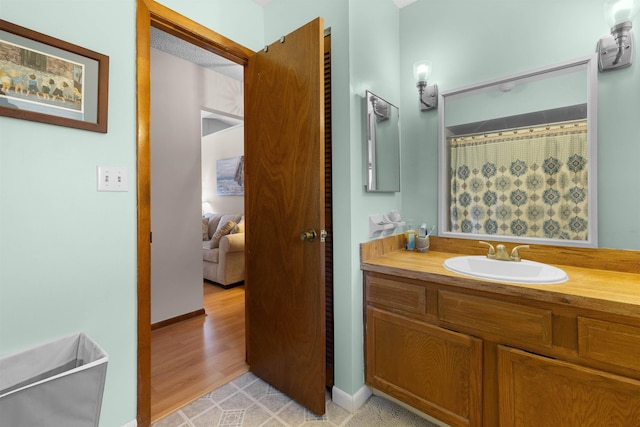 424 Orchis Rd, Saint Augustine, FL 32086 - ensuite bathroom featuring vanity and wood finished floors