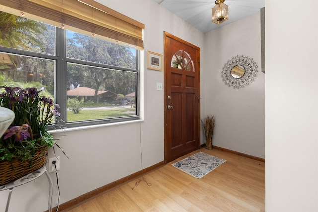 424 Orchis Rd, Saint Augustine, FL 32086 - foyer entrance featuring light wood-style floors and baseboards