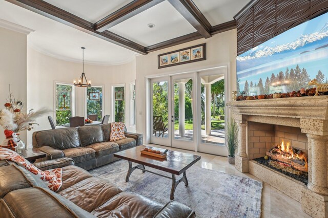 living room featuring a high end fireplace, french doors, light tile patterned floors, an inviting chandelier, and beamed ceiling