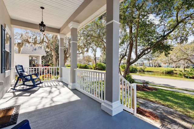 520 Weeping Willow Ln, Saint Augustine, FL 32080 - porch featuring a water view
