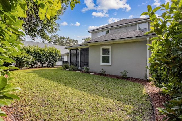 520 Weeping Willow Ln, Saint Augustine, FL 32080 - view of grassy yard featuring a sunroom
