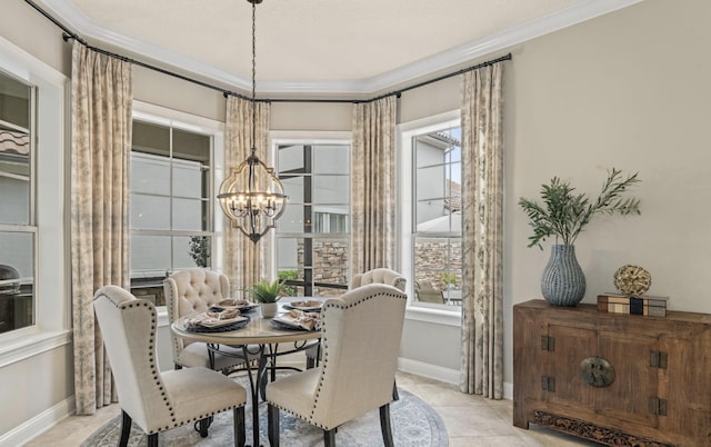 dining area with light tile patterned floors, crown molding, and a chandelier