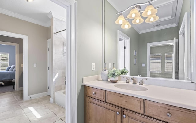 bathroom featuring vanity, tiled shower / bath combo, tile patterned floors, and crown molding