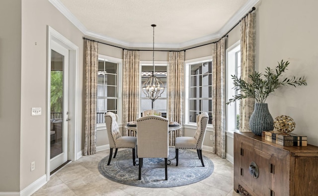 dining room featuring a textured ceiling, crown molding, a notable chandelier, and light tile patterned flooring