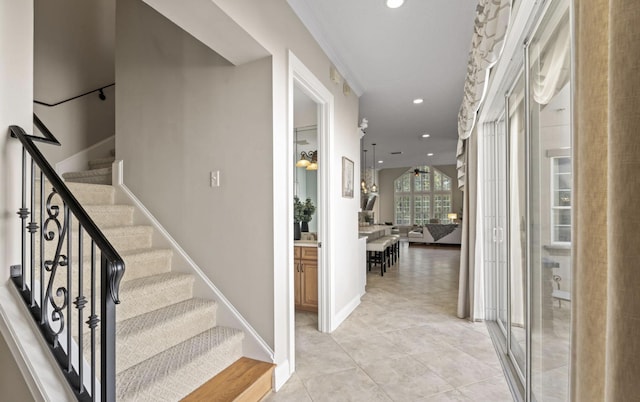 stairs featuring tile patterned flooring