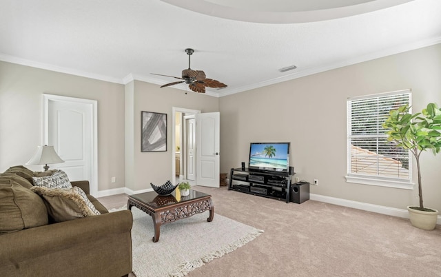 living room featuring ceiling fan, light colored carpet, and ornamental molding