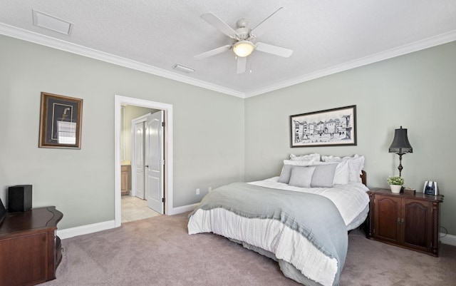 bedroom with ensuite bathroom, crown molding, ceiling fan, a textured ceiling, and light colored carpet