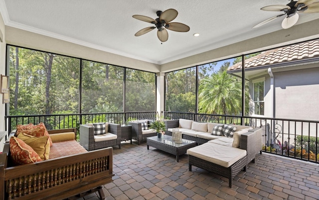 sunroom / solarium with ceiling fan