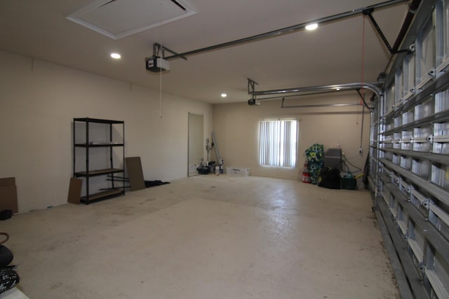 30 Fortress Pl, Palm Coast, FL 32137 - garage featuring a garage door opener and recessed lighting