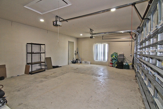 30 Fortress Pl, Palm Coast, FL 32137 - garage featuring a garage door opener and recessed lighting