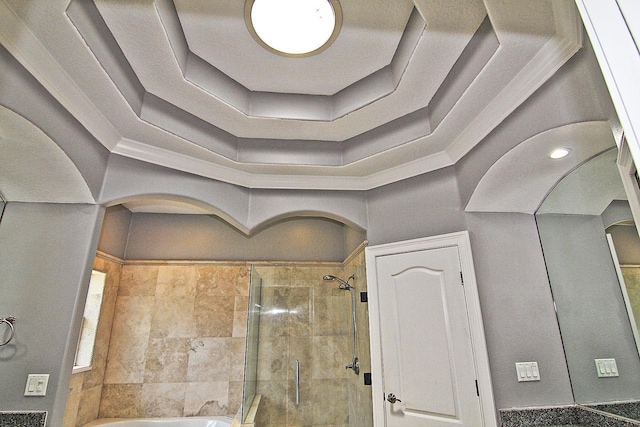 30 Fortress Pl, Palm Coast, FL 32137 - bathroom view of tiled shower, a bathtub, and crown molding