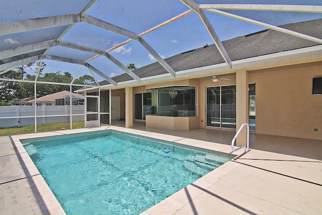 30 Fortress Pl, Palm Coast, FL 32137 - view of swimming pool featuring a patio area, fence, glass enclosure, and ceiling fan