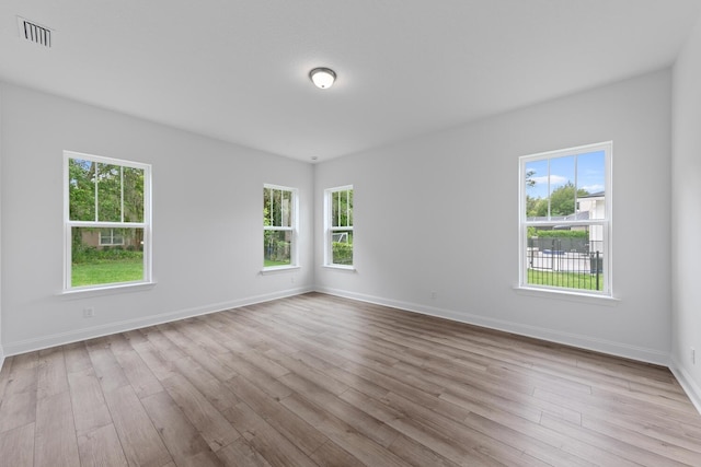 5013 Clayton Ct, Saint Augustine, FL 32092 - spare room with a wealth of natural light and wood finished floors