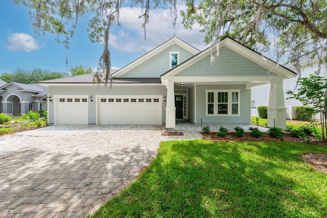 5013 Clayton Ct, Saint Augustine, FL 32092 - back of property featuring a garage and driveway