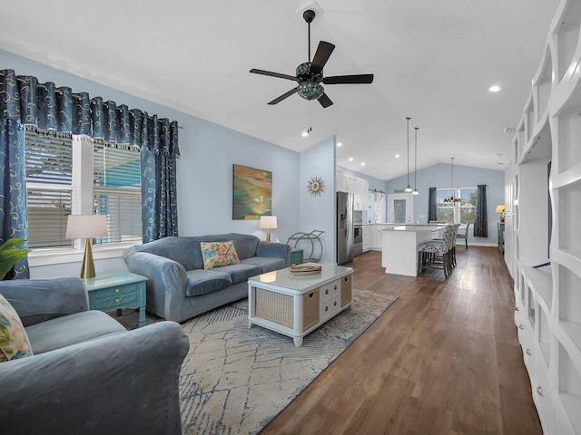 519 Arricola Ave, Saint Augustine, FL 32080 - living area featuring ceiling fan with notable chandelier, wood finished floors, vaulted ceiling, and recessed lighting