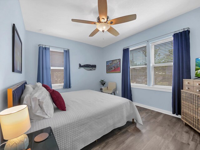519 Arricola Ave, Saint Augustine, FL 32080 - bedroom featuring baseboards, a ceiling fan, and wood finished floors