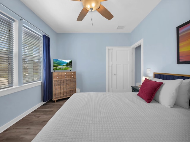 519 Arricola Ave, Saint Augustine, FL 32080 - bedroom featuring a ceiling fan, baseboards, dark wood finished floors, and visible vents