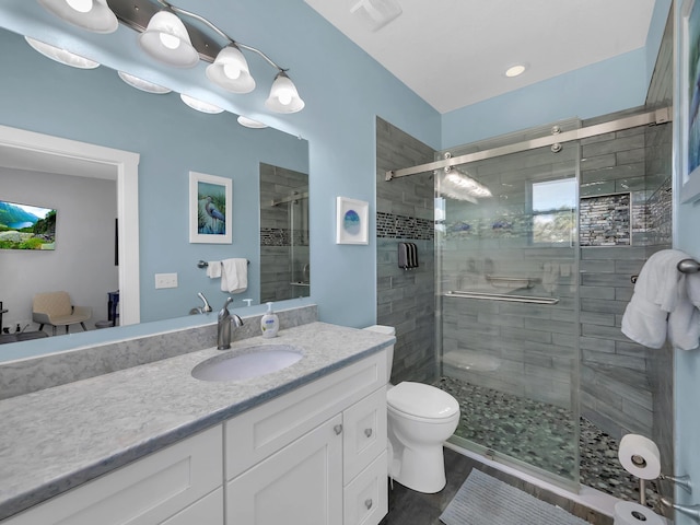 519 Arricola Ave, Saint Augustine, FL 32080 - bathroom featuring toilet, a stall shower, vanity, and visible vents