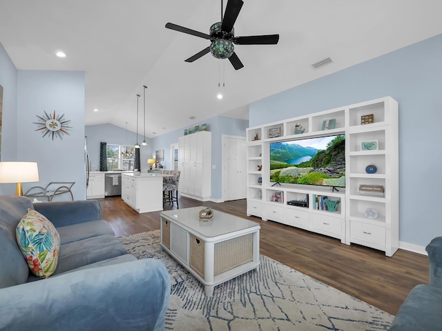 519 Arricola Ave, Saint Augustine, FL 32080 - living room featuring visible vents, baseboards, ceiling fan, vaulted ceiling, and dark wood-type flooring