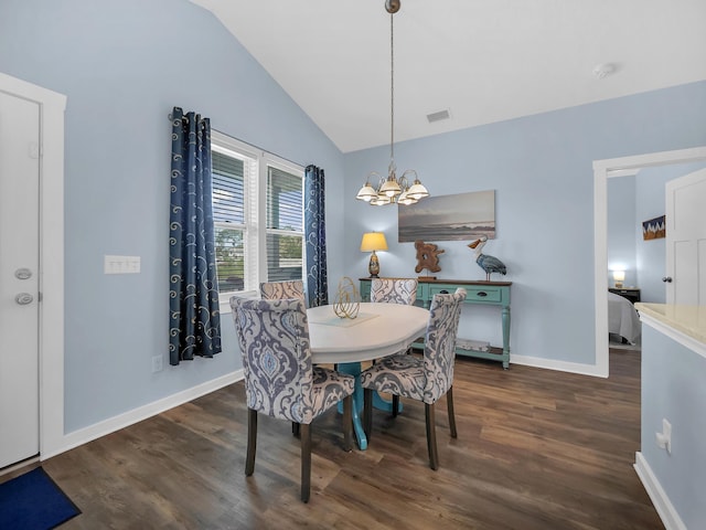 519 Arricola Ave, Saint Augustine, FL 32080 - dining room featuring a chandelier, dark wood-style floors, lofted ceiling, and visible vents