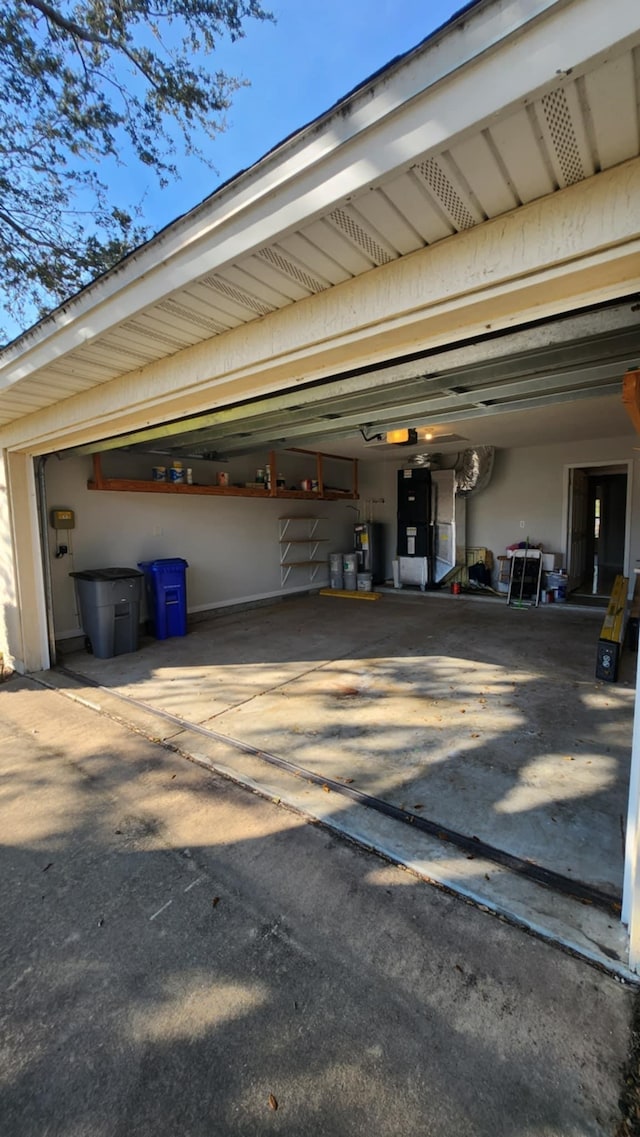 garage featuring driveway