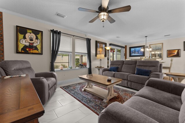 196 Sawmill Forest Ct, Saint Augustine, FL 32086 - living area featuring light marble finish flooring, ceiling fan, a chandelier, plenty of natural light, and ornamental molding