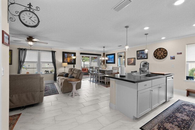 196 Sawmill Forest Ct, Saint Augustine, FL 32086 - kitchen featuring a sink, light marble finish floors, dark countertops, open floor plan, and stainless steel dishwasher