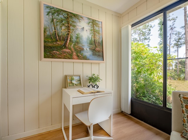9 Kings Colony Ct Unit 9, Palm Coast, FL 32137 - office with light wood finished floors and a decorative wall