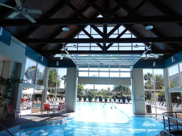 66 Village Del Lago Cir, Saint Augustine, FL 32080 - community pool with a patio area, glass enclosure, and ceiling fan