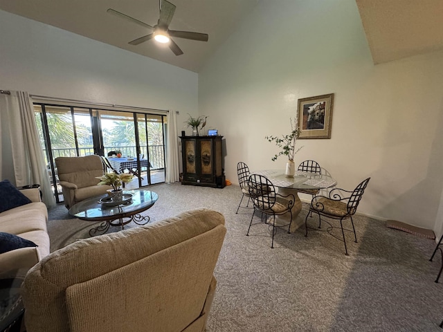 66 Village Del Lago Cir, Saint Augustine, FL 32080 - living area featuring baseboards, high vaulted ceiling, ceiling fan, and carpet flooring