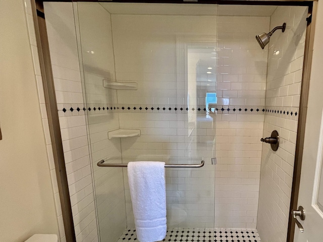 full bathroom with a shower stall