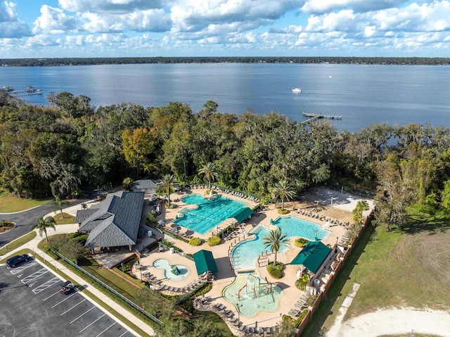 birds eye view of property featuring a water view