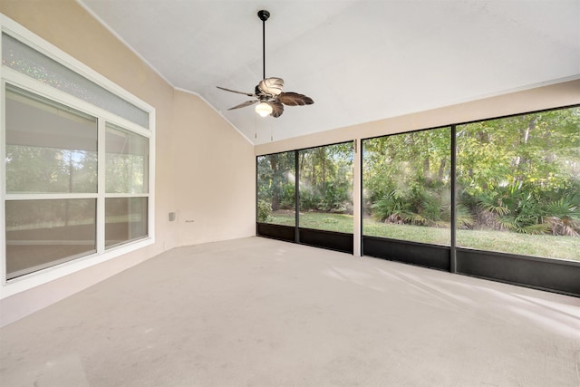 unfurnished sunroom featuring ceiling fan and lofted ceiling