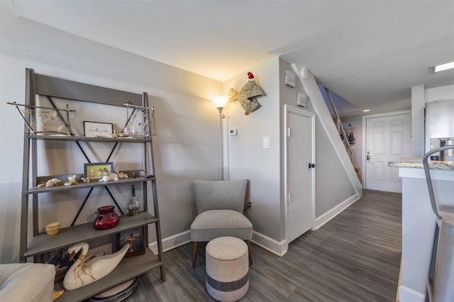 living area with dark wood-type flooring