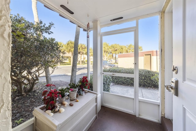 sunroom featuring a wealth of natural light